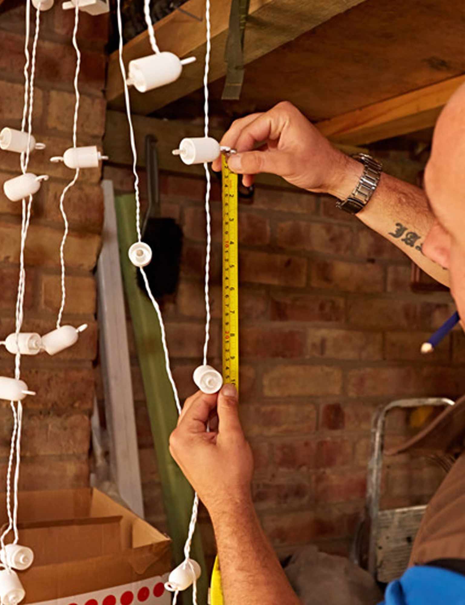 Measuring length of cable between each festoon socket