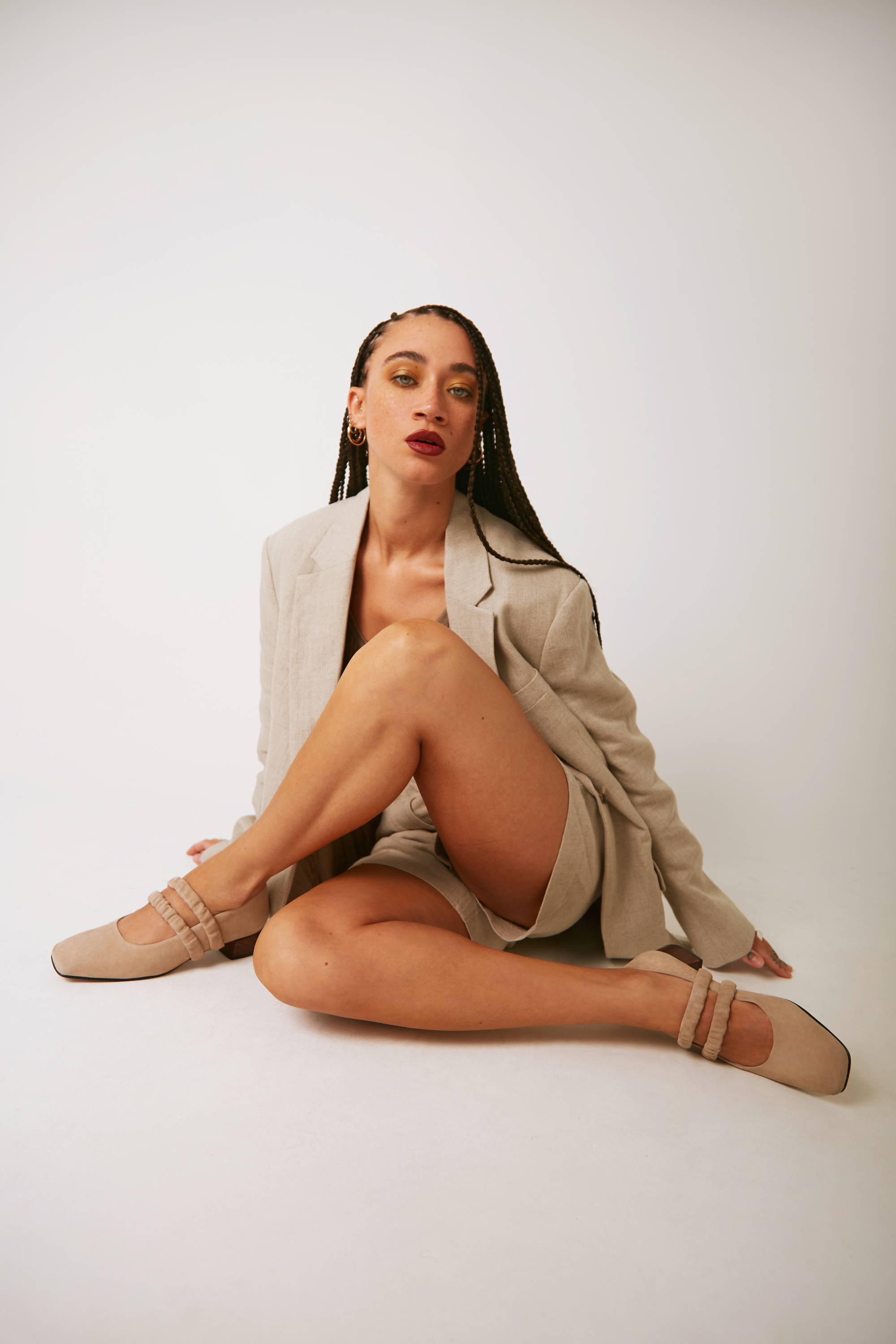 Vandrelaar Ruth Pump mary-jane worn by model and styled with a beige tailored suit