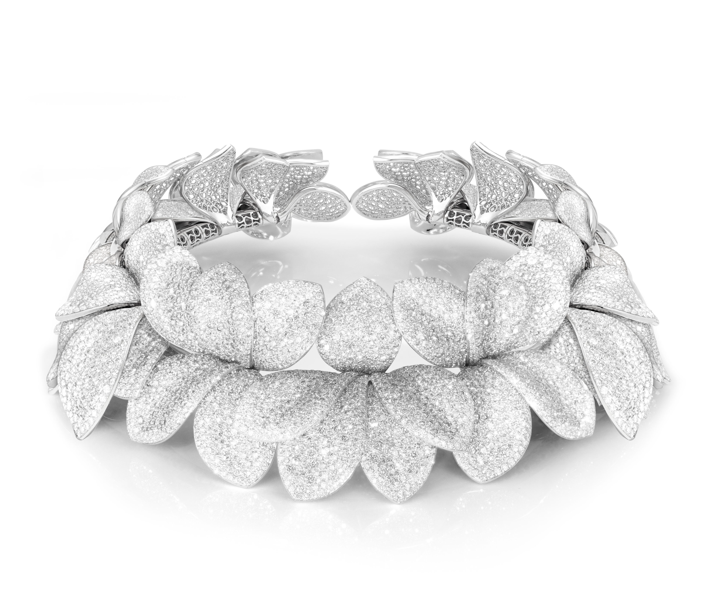 A sparkly silver bracelet with leaf-shaped designs.