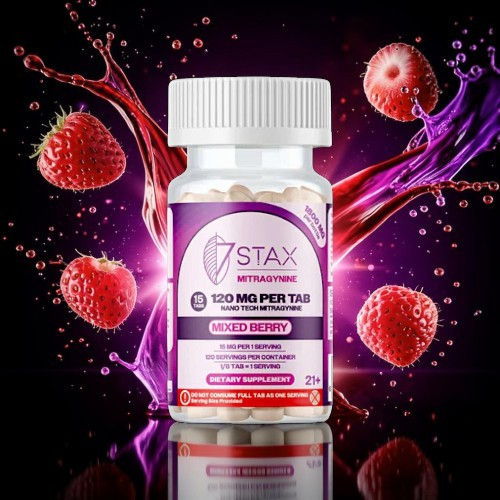 Bottle of dietary supplement with strawberries and colorful splashes in the background.
