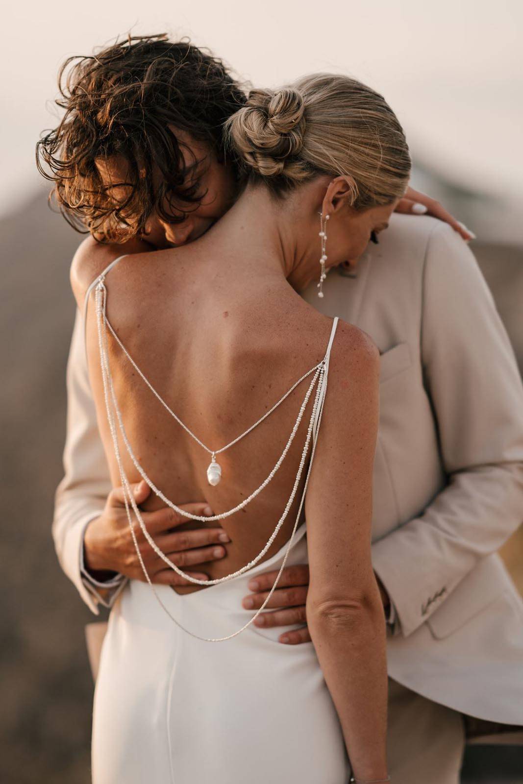Back of Bride's gown paired with backpiece