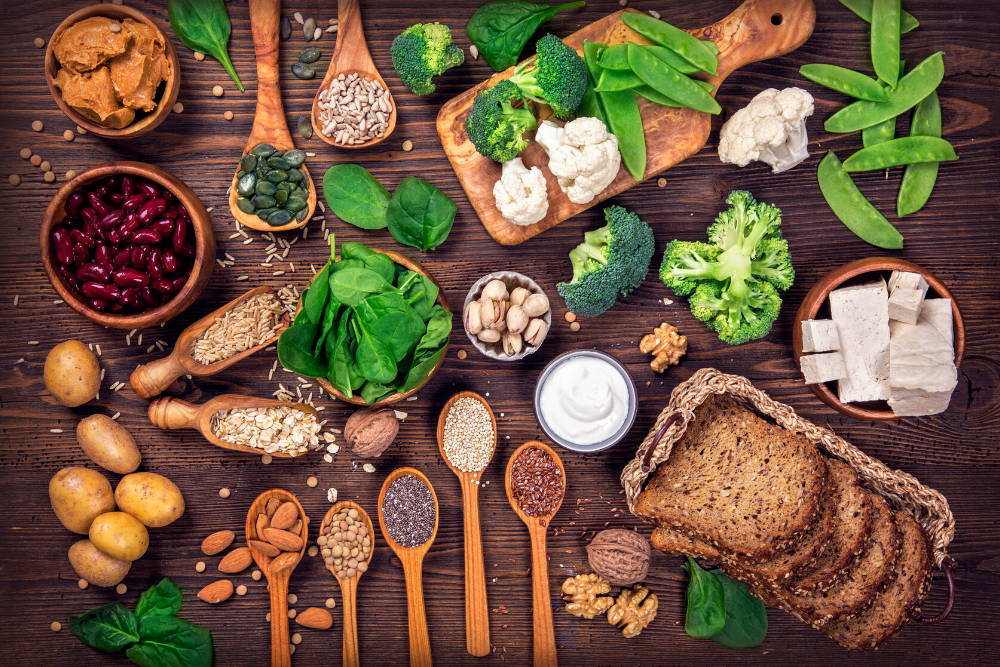 different foods for plant protein on wooden table|what are the benefits of plant protein