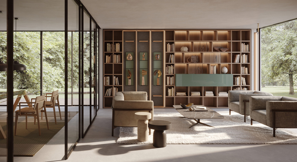 Modern interior with a bookshelf, desk, chair, and large windows.