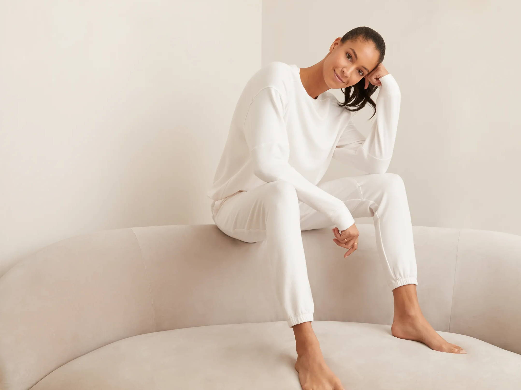 Shop Luxe Lounge. Photo Featuring  our Off Duty Sweatpant and Blocked Crewneck in Bone.