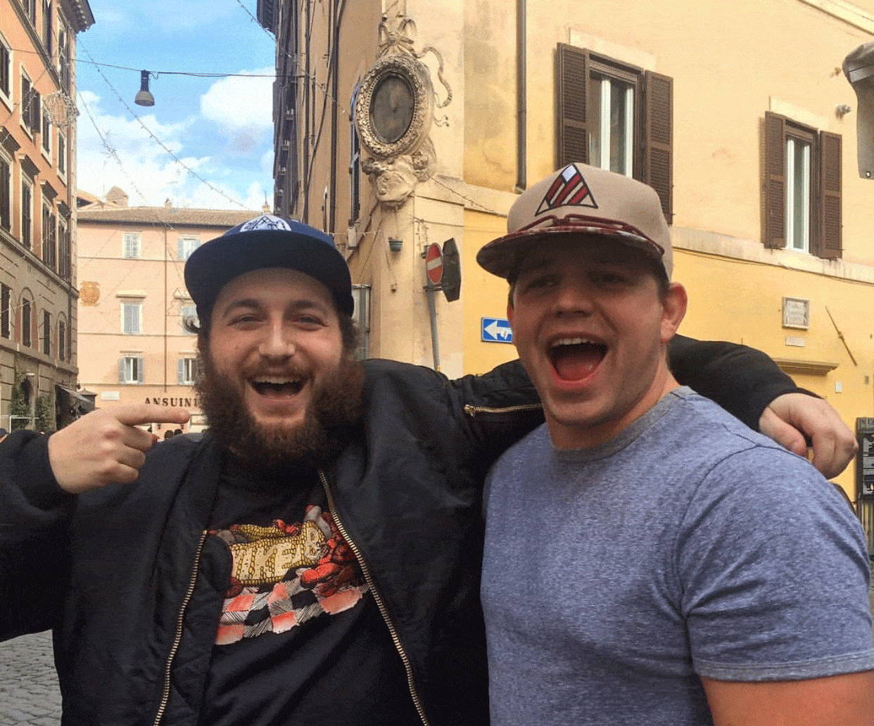 Photo of Jimmy from Findlay and a guy he ran into in Rome wearing a Findlay Hat