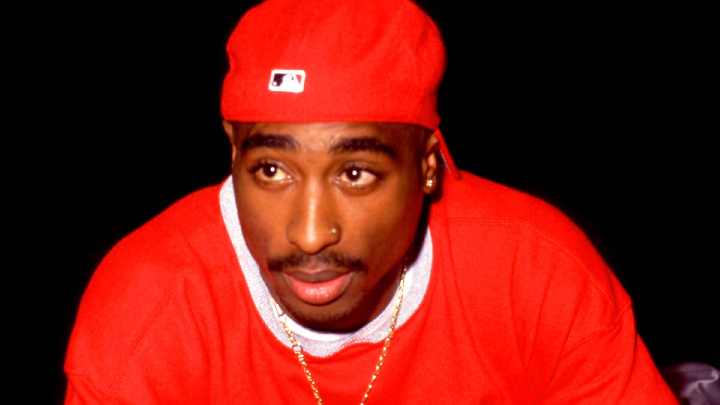 tupac in all red