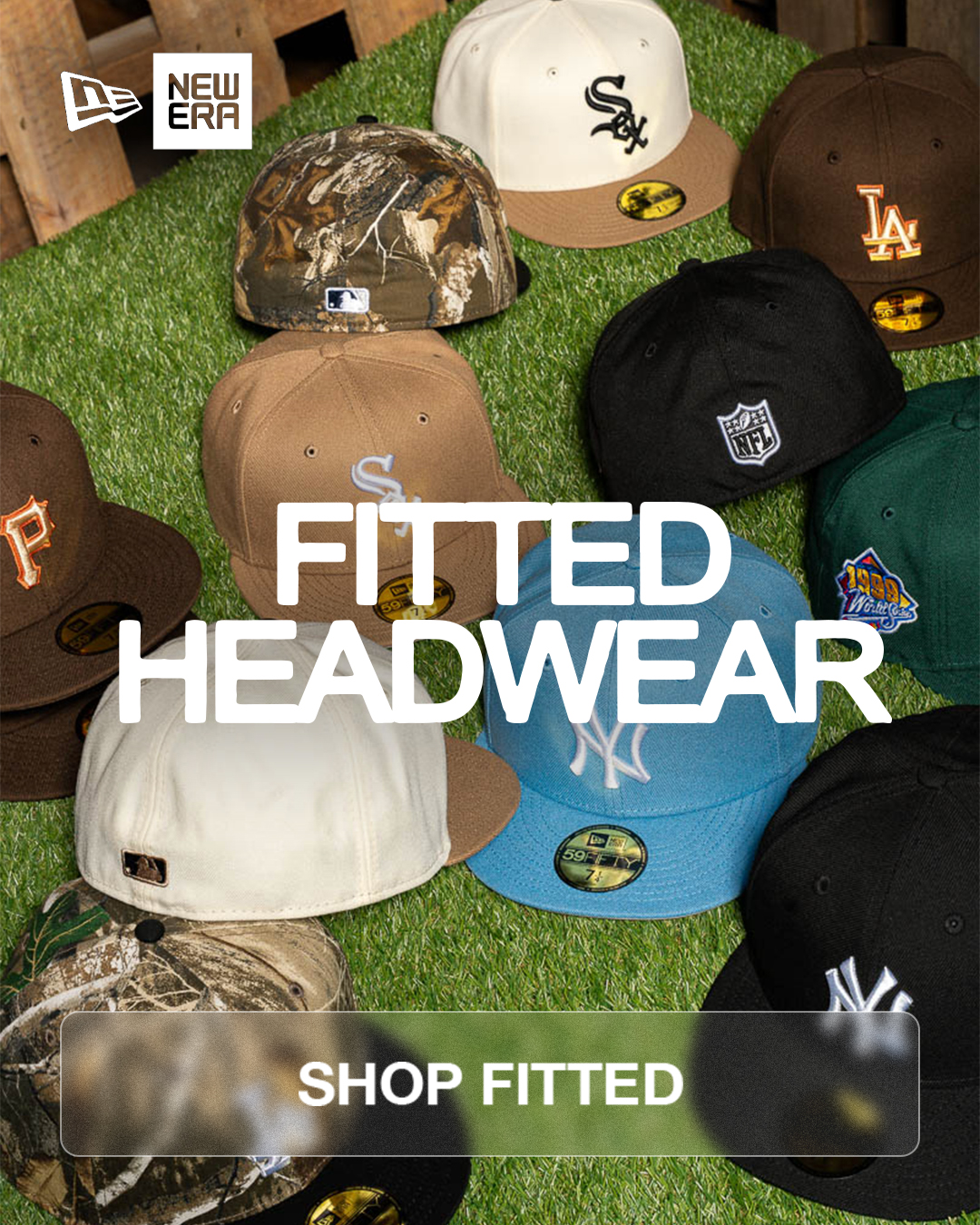 Fitted caps displayed on grass with 