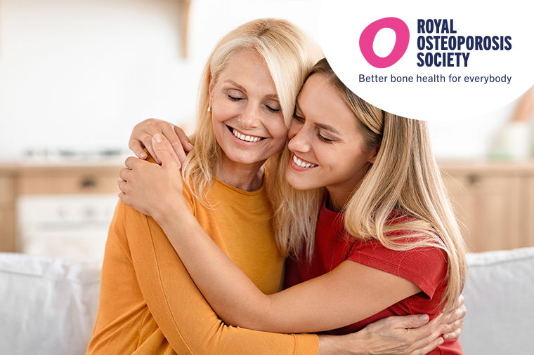 Younger Woman Holding Older Women