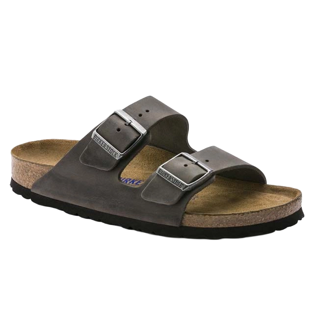 Brown two-strap sandal with buckles and a cork footbed.