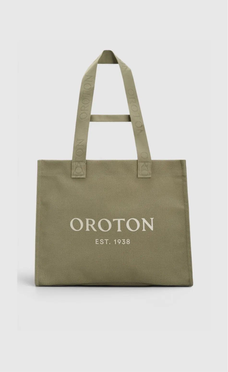 Green Oroton tote bag with logo and established date.