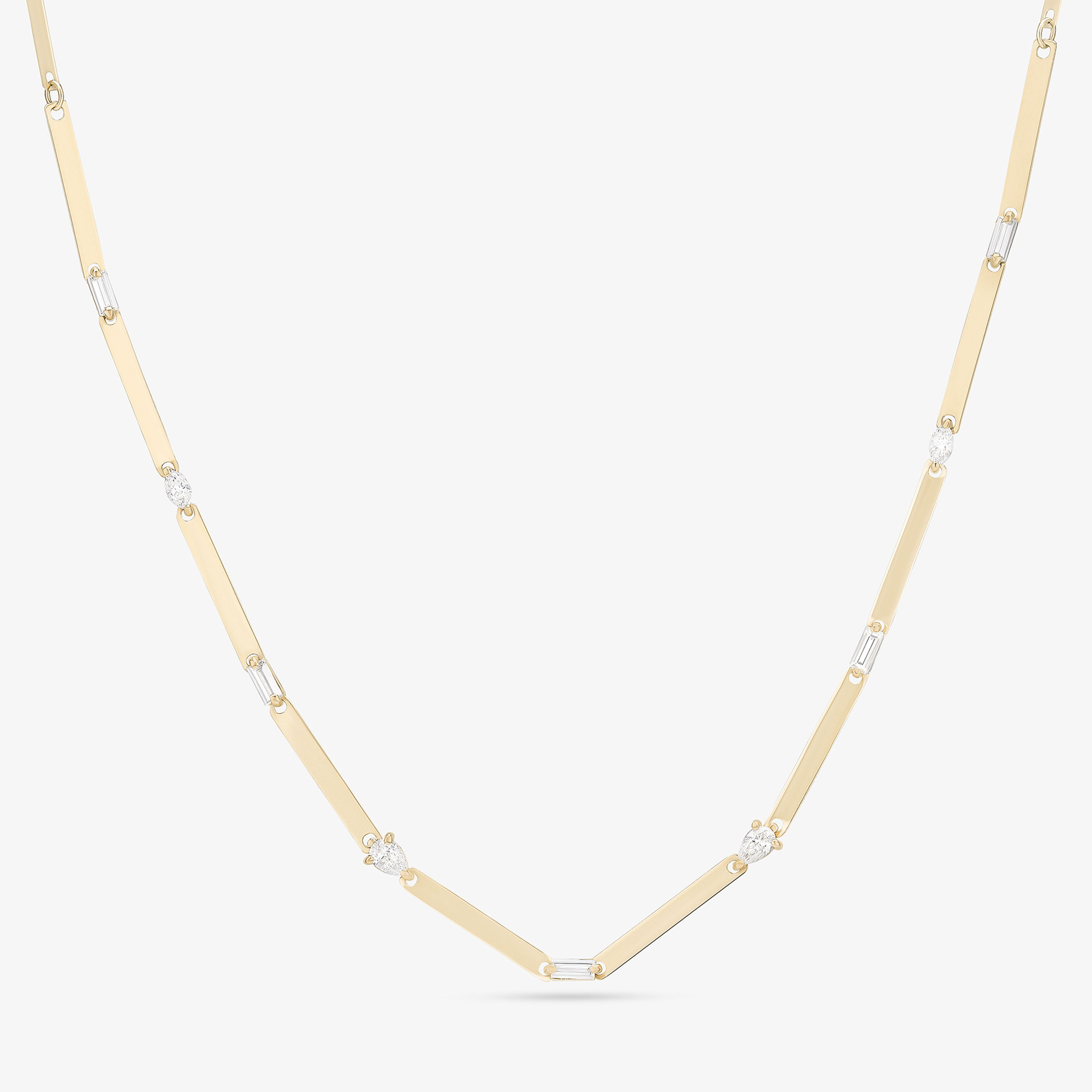 Yellow gold necklace featuring a modern V-shaped pendant accented with bezel-set diamonds.