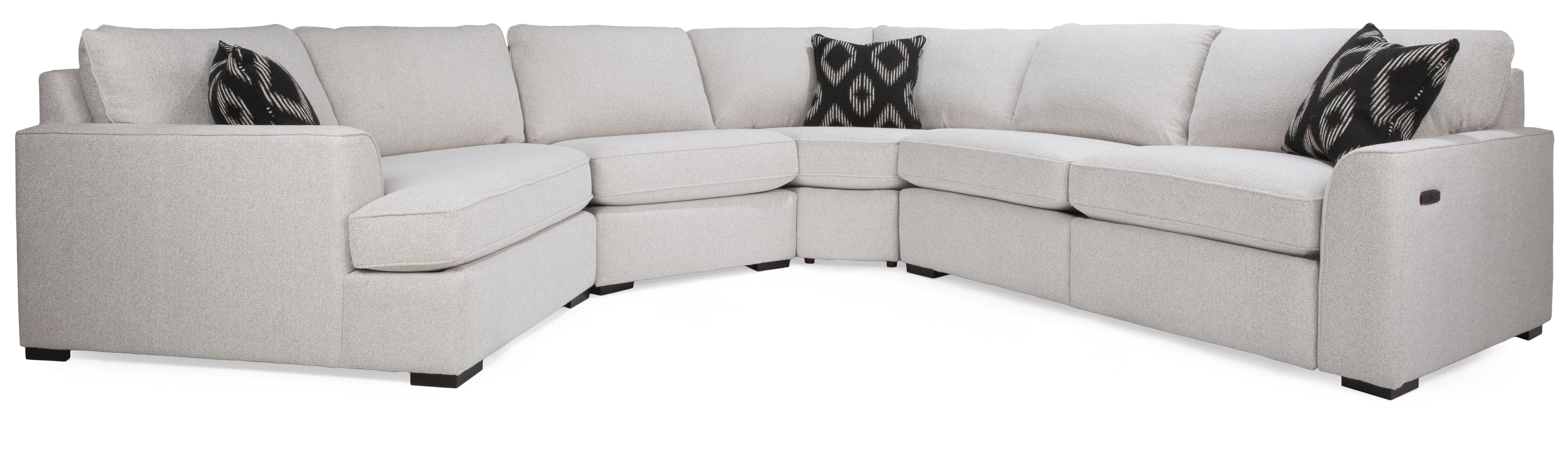 L-shaped beige sectional sofa with decorative pillows.