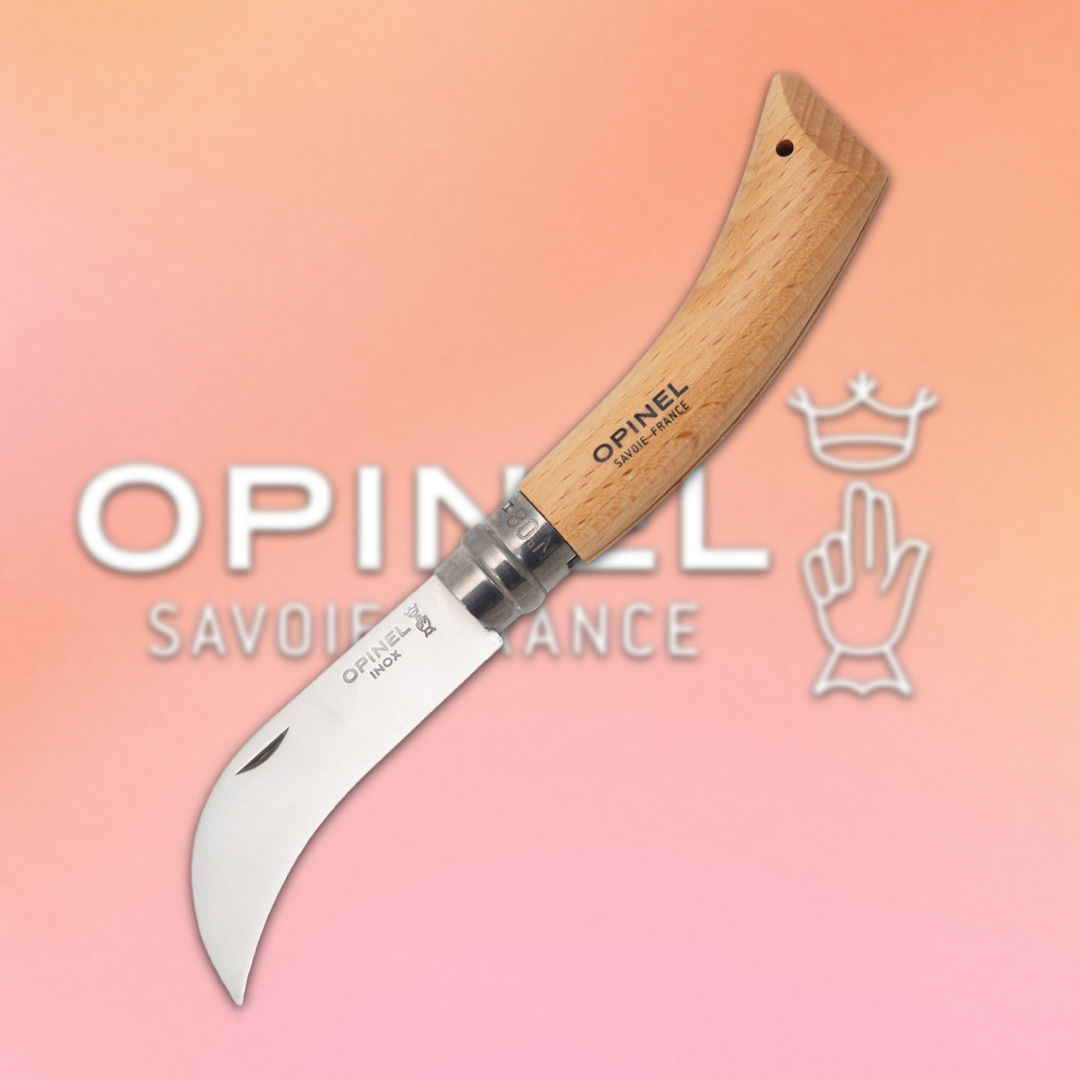 Opinel knife with a wooden handle on a colorful background.