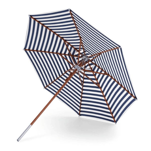 Blue and white striped patio umbrella with wood frame for stylish outdoor dining shade and poolside seating.
