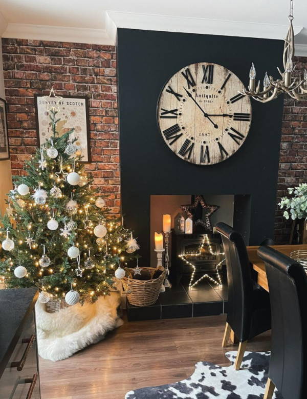 Dining room setting with an Osby star in the fireplace.