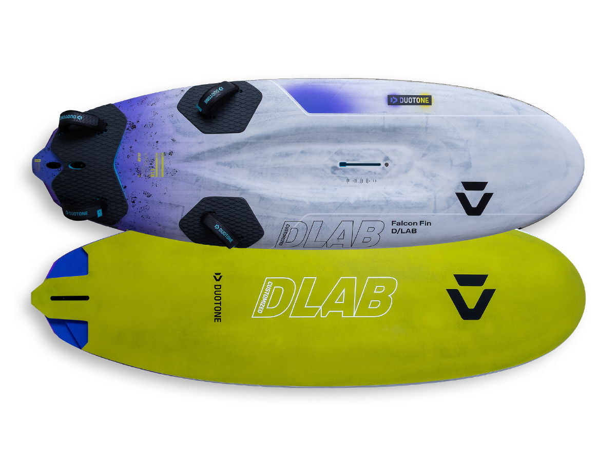 Two surfboards, one white with purple, one yellow with logo.