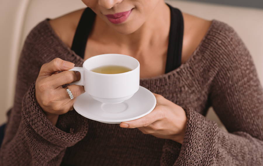 woman drinking green tea