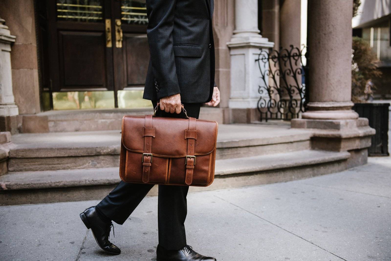 businessman with computer brief bag