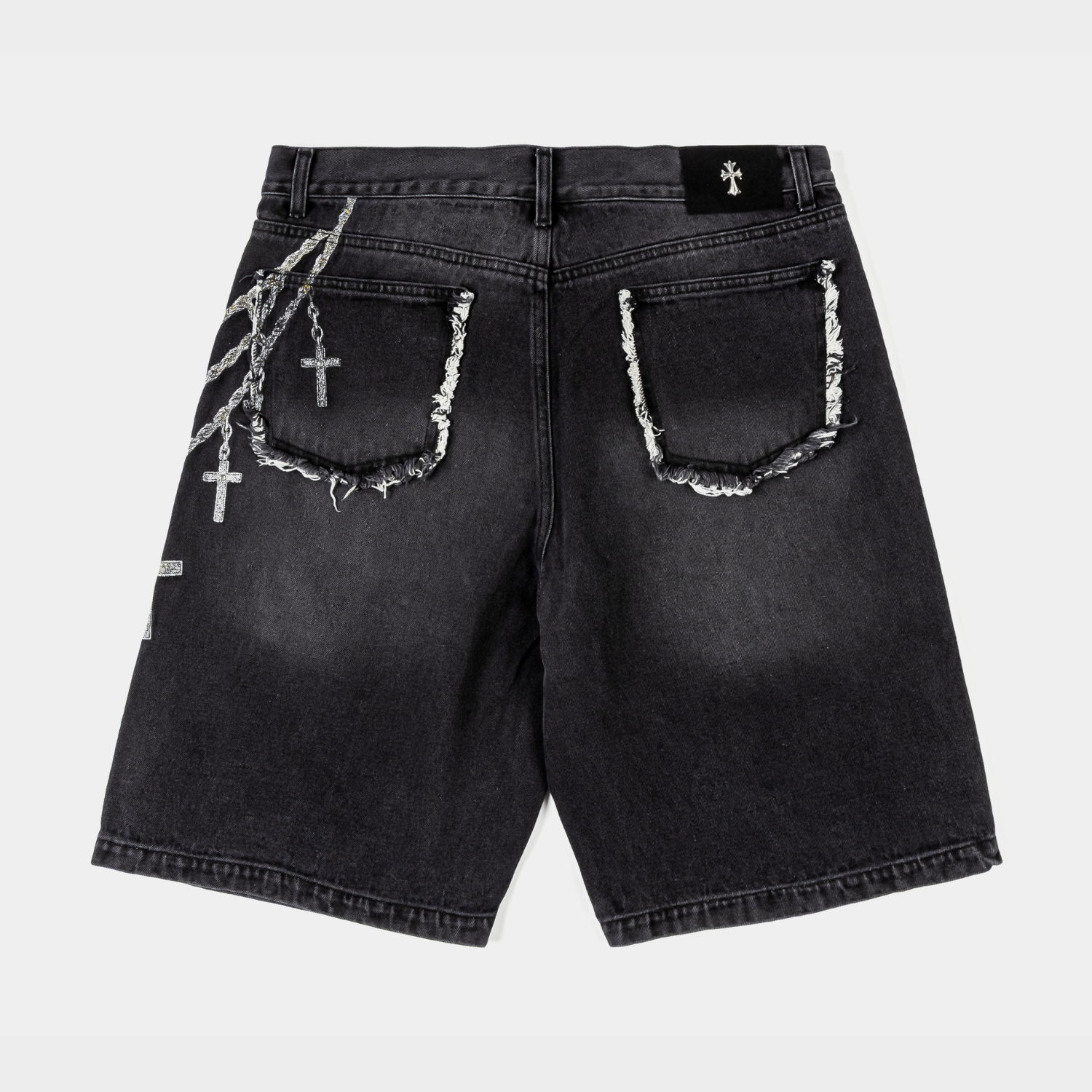 Black denim shorts with cross embellishments and chain design.