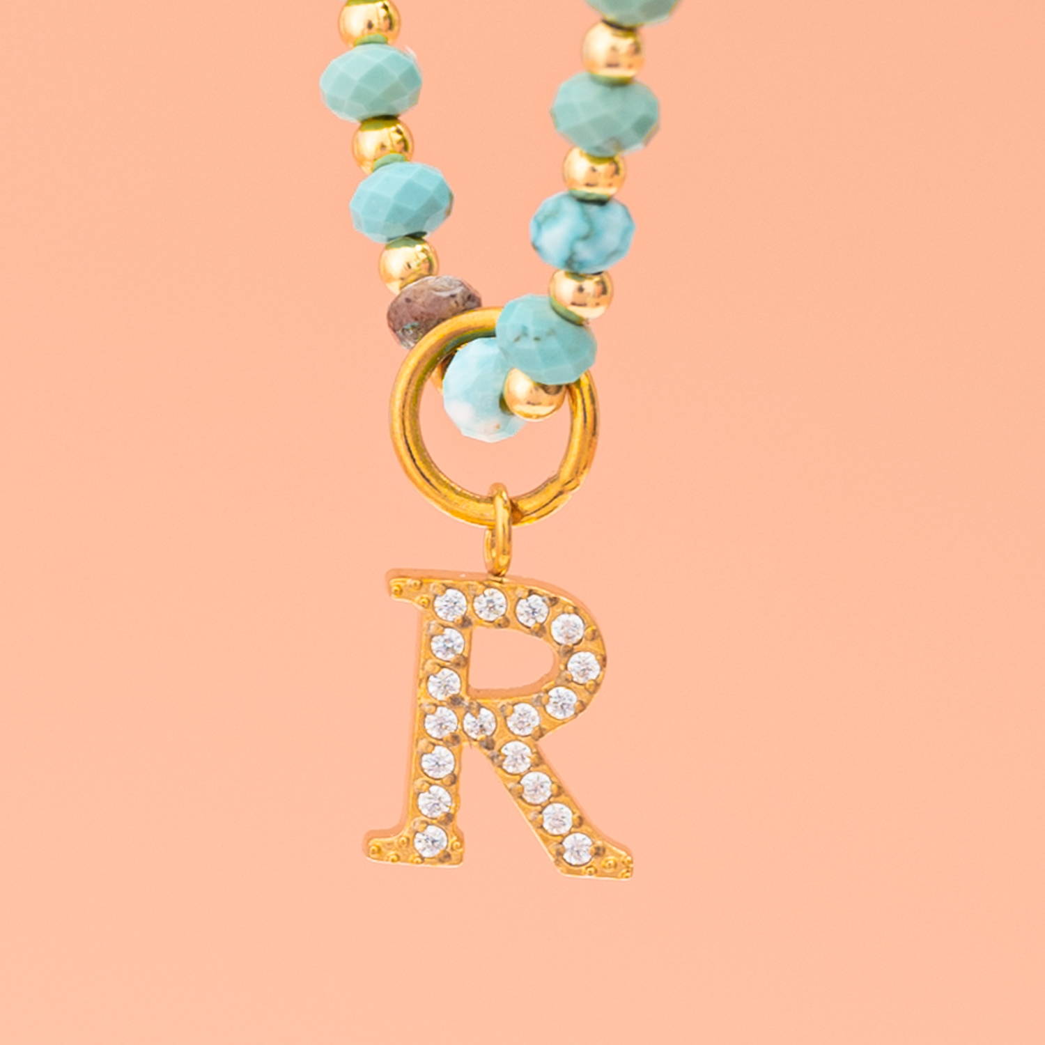 https://wholesale.starfishproject.com/collections/mothers-day-collection/products/turquoise-beaded-necklace-with-initial-charm