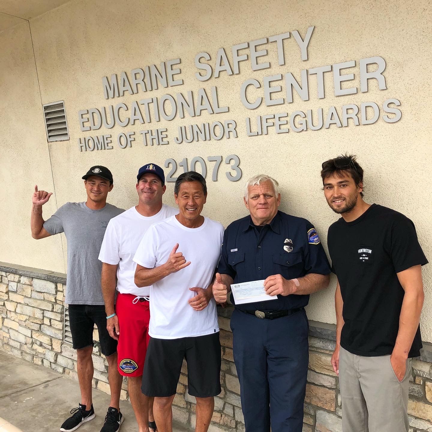 5 people standing in front of Marine Safety Center