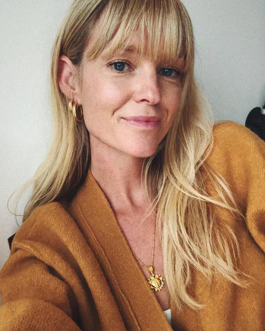 Jeanette Friis Madsen wears Soru Jewellery 18ct gold plated agate gemstone sun necklace 