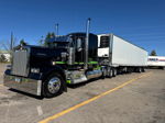 Black Kenworth lime green stripe white reefer trailer Blackhawk Express chrome stacks sunny parking lot Glen's 2023 Kenworth W900 Outlaw train horn gallery photo 3