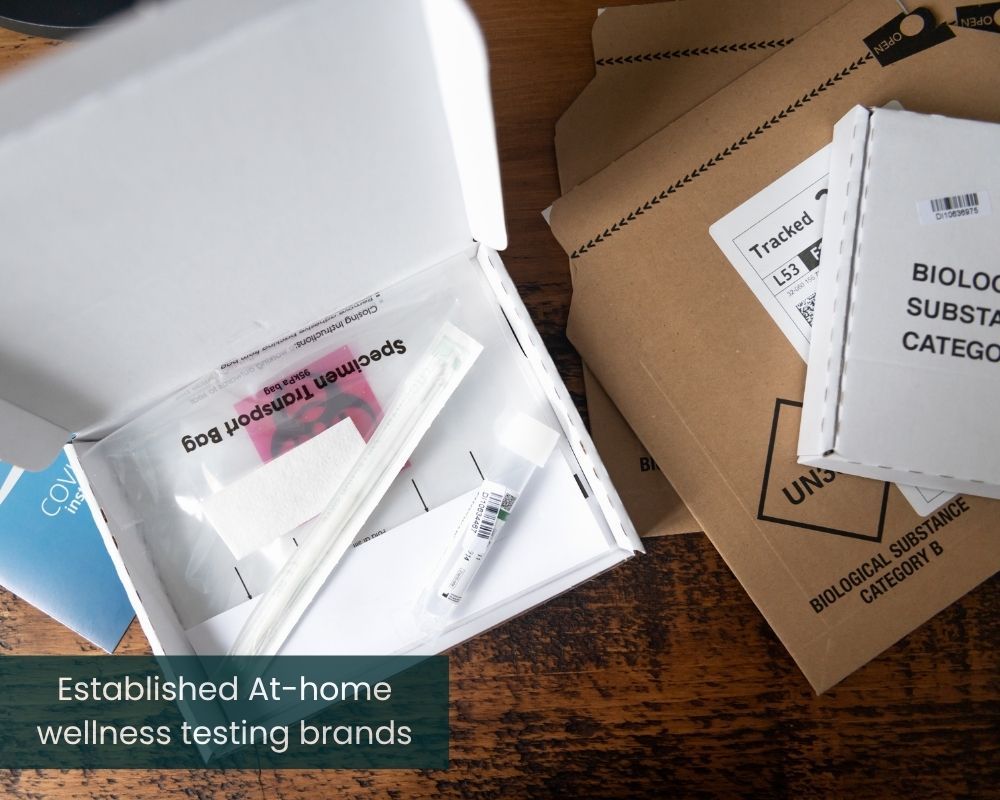 At-home wellness testing kit with instructions and packaging materials.
