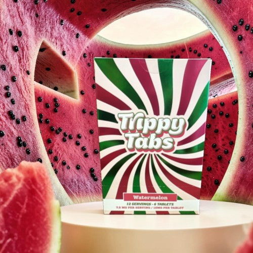 Box of Trippy Tabs in a watermelon background.