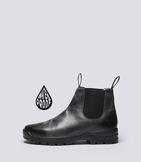 Waterproof Chelsea boot with pull tabs and textured design.