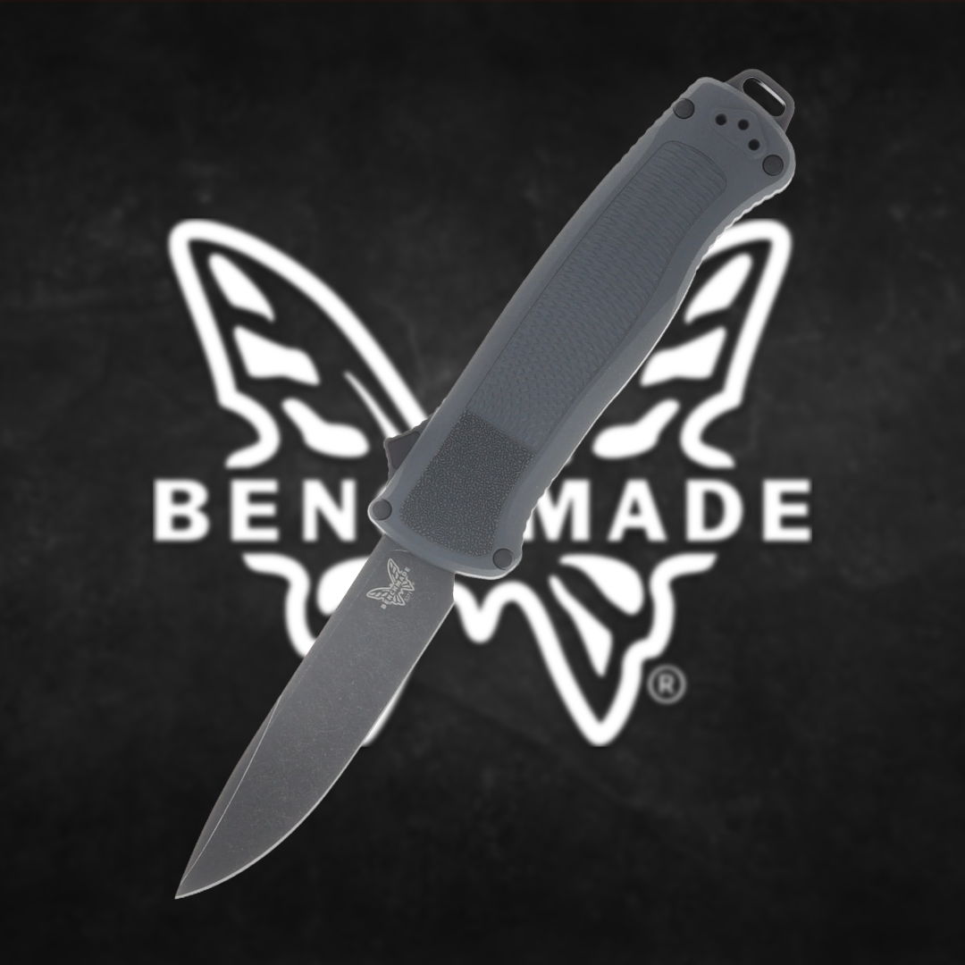 A butterfly knife with a gray handle over a black background.