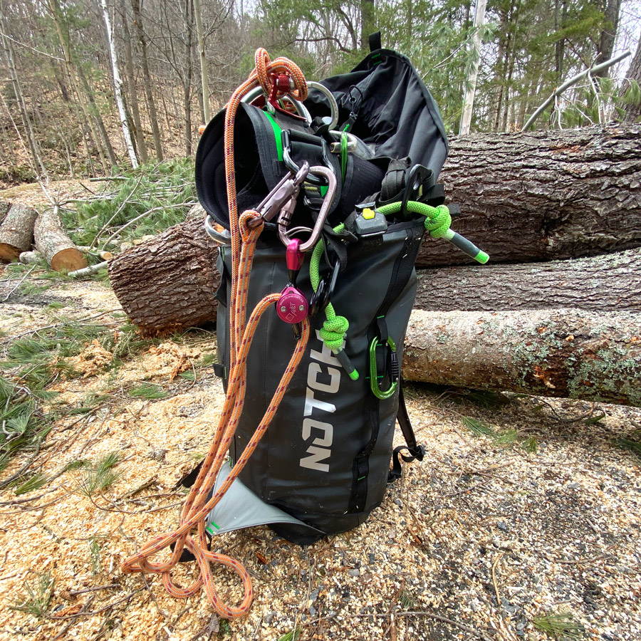 Notch Pro Access bag in the woods packed full with tree climbing gear