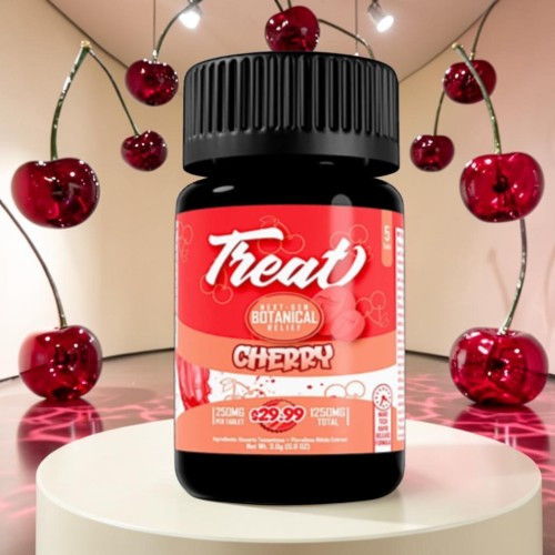 Bottle of cherry-flavored treat on a pedestal with cherry decorations.