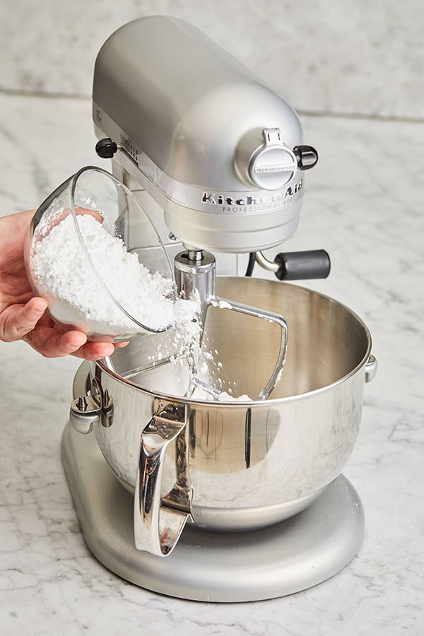 Powdered sugar going into stand-mixer