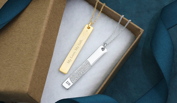 vertical bar pendants engraved with a fingerprint