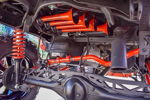 Underside four orange red train horns rear axle red sway bar lattice control arms black tank Billy's Tacoma 244K gallery photo 4