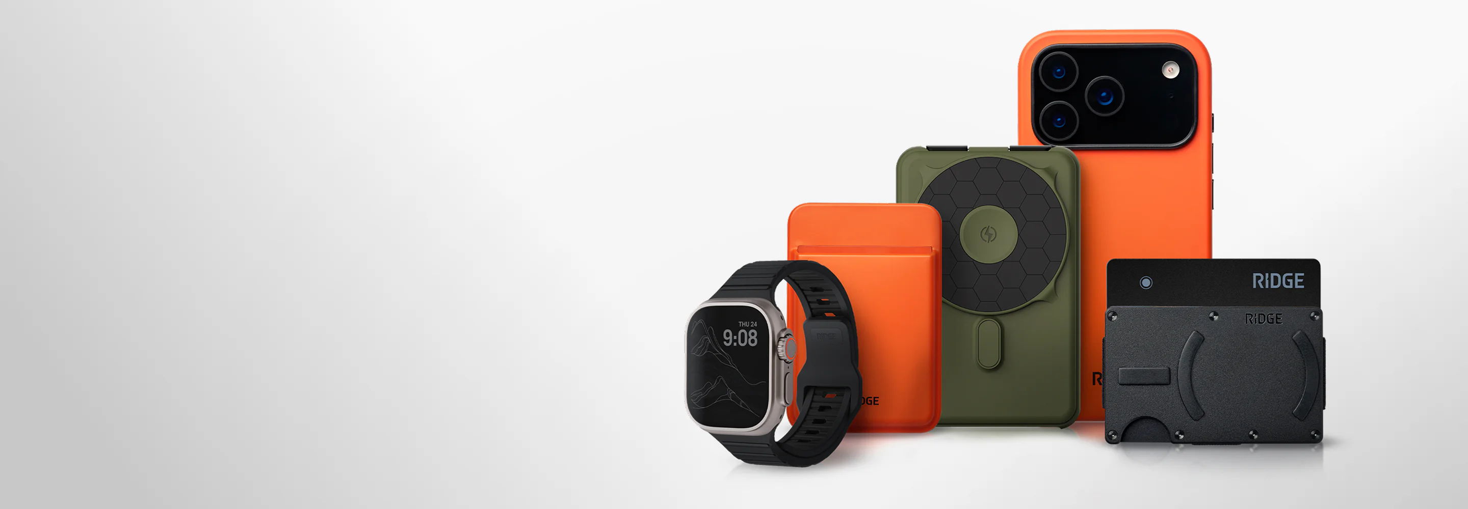 Various tech gadgets and accessories in orange and black colors.