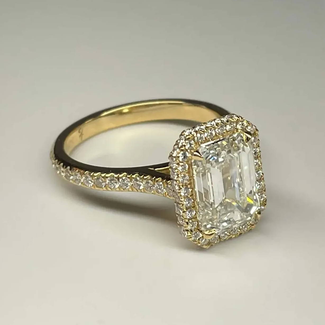 emerald cut halo engagement ring