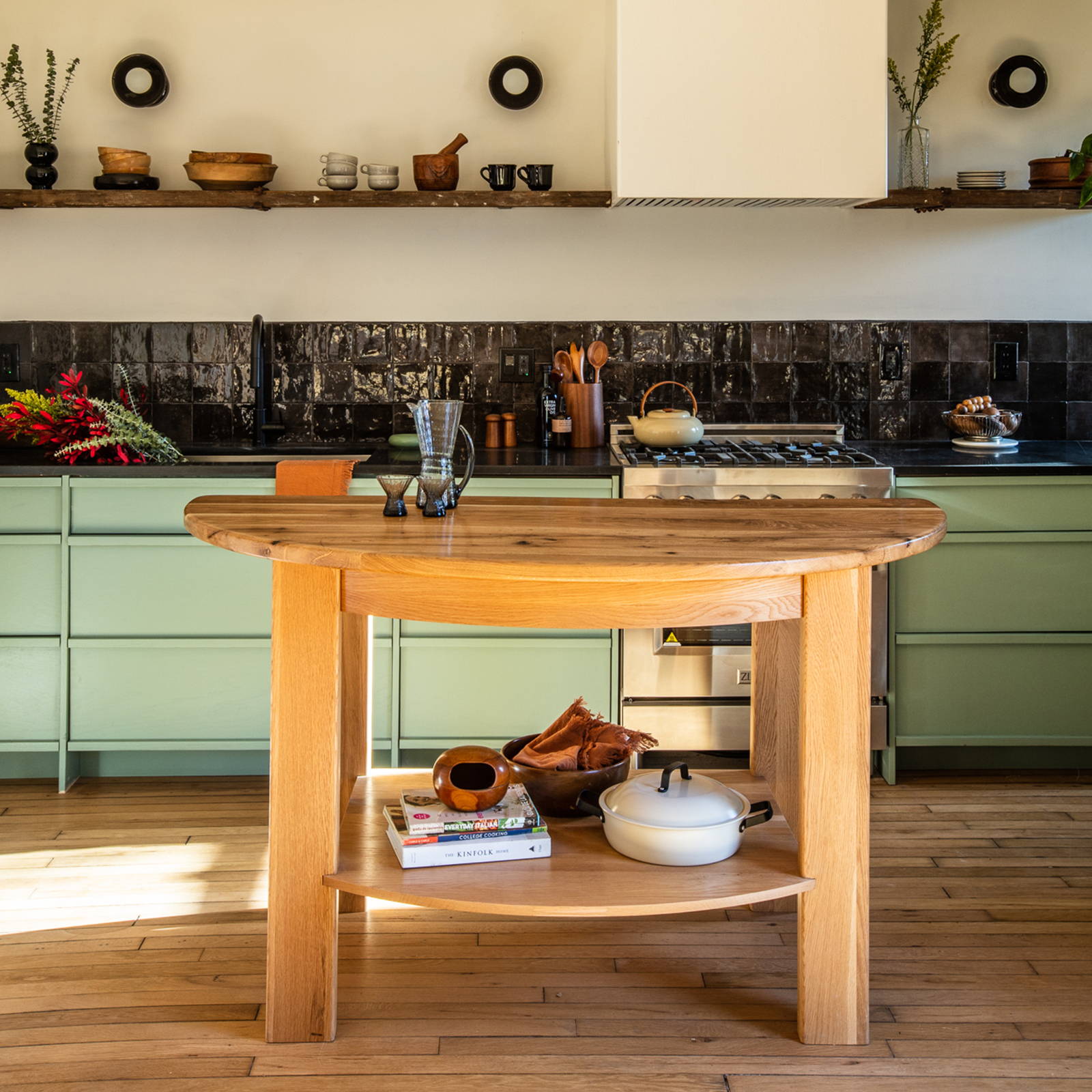Modern kitchen interior design, featuring a half-mood kitchen island in white oak from Woodward Throwbacks.