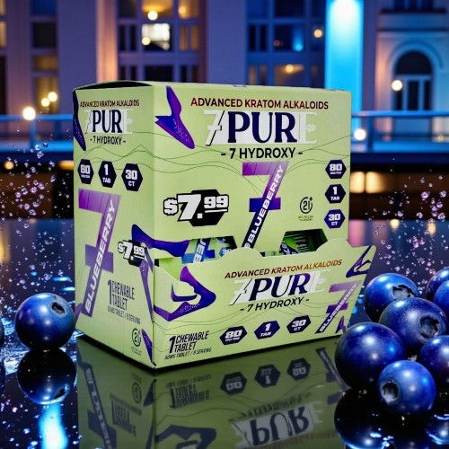 Box of PUR Hydroxy product with blue spheres on a reflective surface.