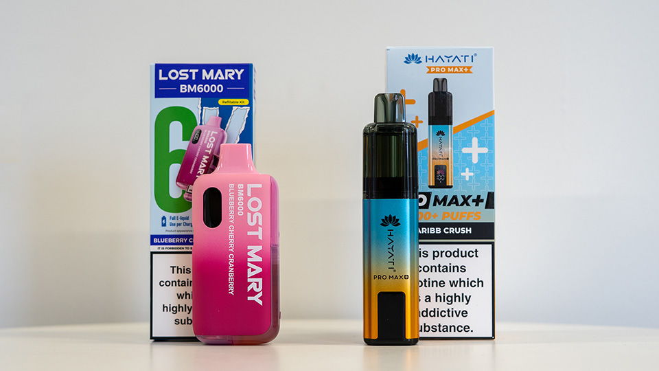 Lost Mary BM6000 vs Hayati Pro Max Plus price comparison showing devices, pods and packaging