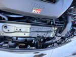 Under-grille view of horn mounting and wiring behind front bumper on 2024 Toyota GR Corolla Sniper electric horn gallery photo 4