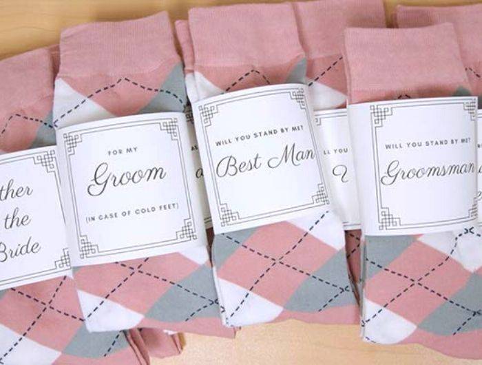 Blush pink socks with wedding labels