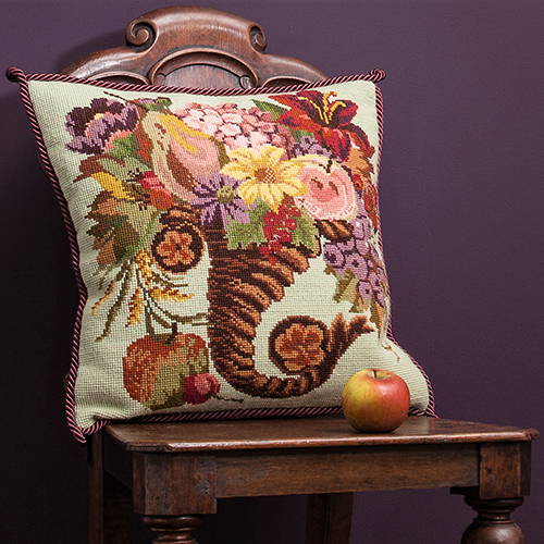 Autumn Cornucopia needlepoint cushion on chair