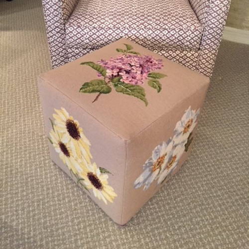 Blooms needlepoint panels finished as a cubed foot stool