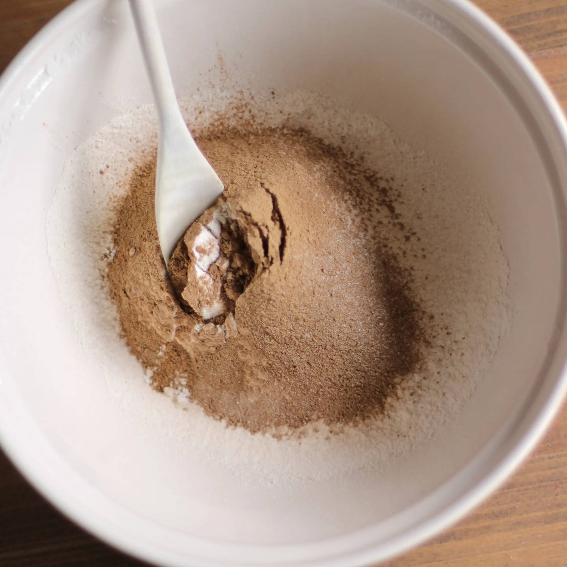 Dry biscuit ingredients sifted and mixed in a bowl