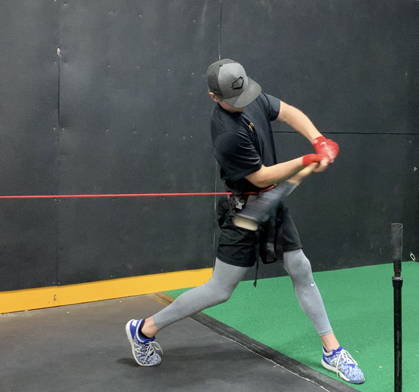 baseball bat speed training using hip hanress resisted