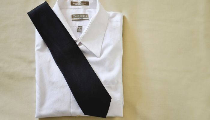 Black necktie on a white dress shirt