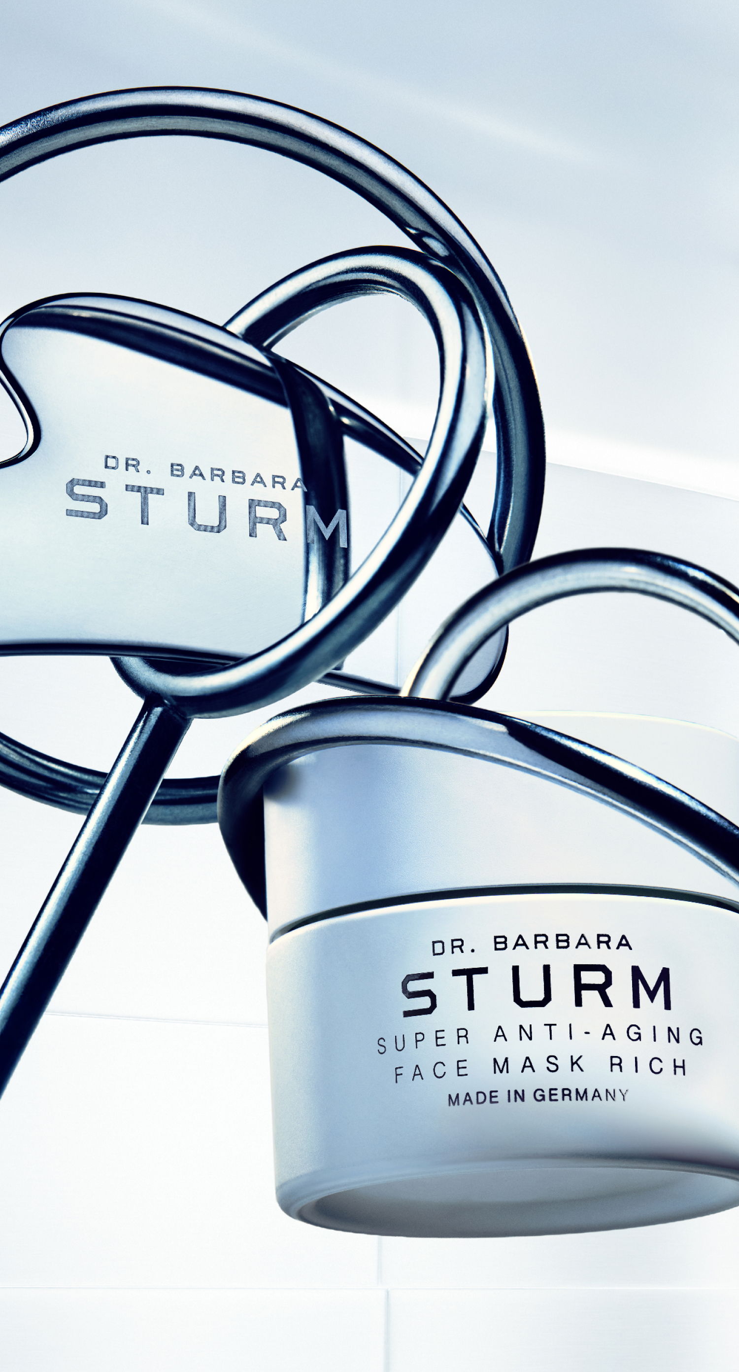 Dr. Barbara Sturm anti-aging face mask rich in a reflective setting.