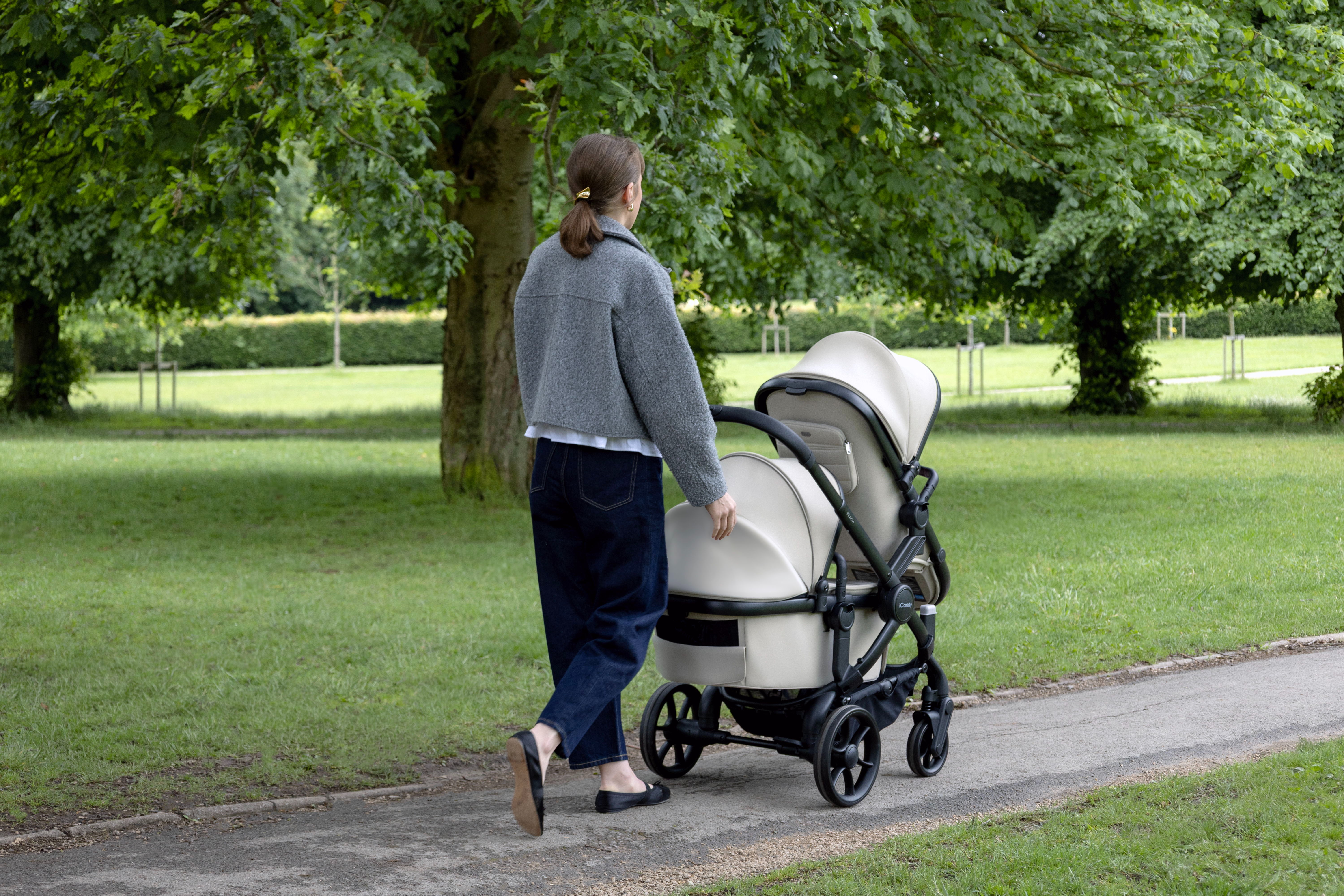 Woman pushing the iCandy Peach 8